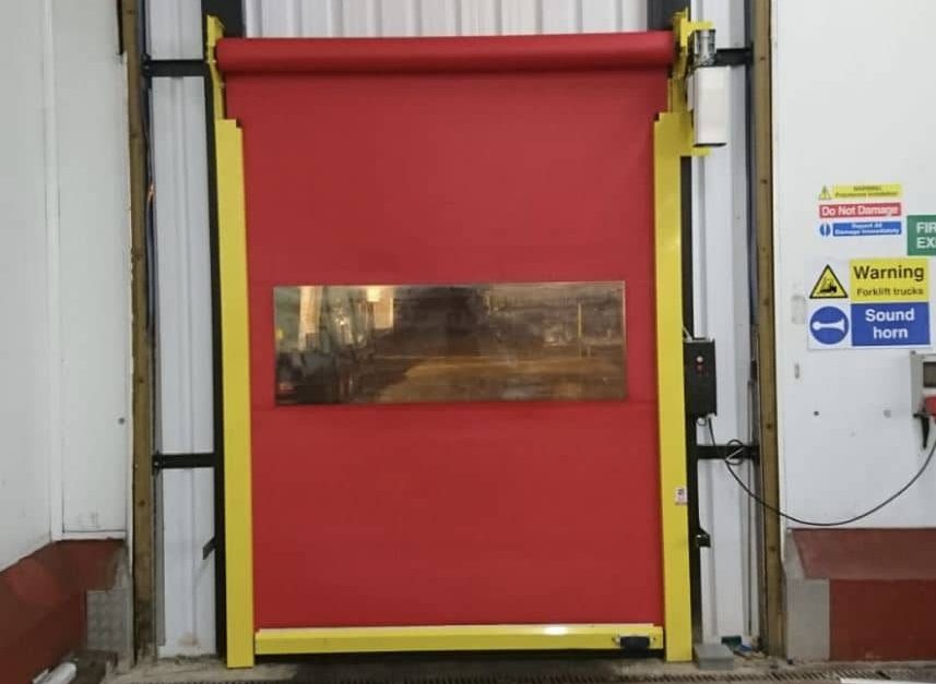 red roller doo with window and yellow frame